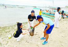 Lin-ay sang Iloilo 2023 candidates collect rubbish in Gigantes Island, Carles, Iloilo during a coastal cleanup activity on Sept. 23. LIN-AY SANG ILOILO FB PHOTO