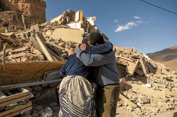 quake_resized Family members console each other near the rubble of collapsed buildings in the village of Imi N’Tala near Amizmiz in central Morocco after a deadly magnitude 6.8 earthquake hit the country last week. AFP