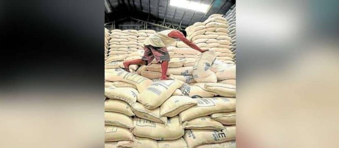 rice_superimposed Sacks of rice are stockpiled at the National Food Authority warehouse in Quezon City. FILE PHOTO