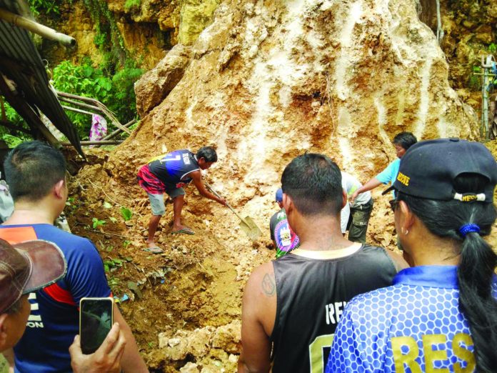 rockslide_1_resized A 19-year-old girl was buried under a rockslide in Dumangas, Iloilo on Saturday morning, Sept. 2. DUMANGAS DREAM MDRRMO