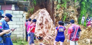 A 19-year-old girl was killed by a rockslide in Barangay Sulangan, Dumangas, Iloilo on Saturday, Sept. 2. Photo shows personnel of the Bureau of Fire Protection-Dumangas, Dumangas police station and Municipal Disaster Risk Reduction and Management Office getting ready to retrieve the victim’s body. DUMANGAS DRRMO PHOTO