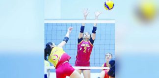 Bacolodnon Rhean Almendralejo of the Enderun College Lady Titans blocks the shot of Mapua University Lady Cardinals’ Roxie dela Cruz. V-LEAGUE PHOTO
