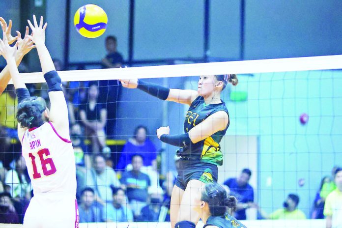 sports_FEU.JPG_resized Negrense Kiesha Bedonia of Far Eastern University Lady Tamaraws drills a powerful hit against a University of Perpetual Help Lady Altas defender. PHOTO COURTESY OF V-LEAGUE