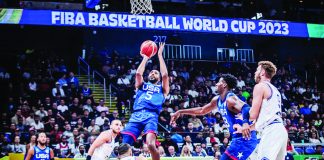 Mikal Bridges of Team USA pulls up for a jumper against the defense of Italy’s Marco Spissu. FIBA PHOTO