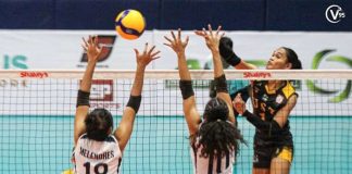 University of Santo Tomas Golden Tigresses’ Angeline Poyos smashes the ball towards the defense of Colegio de San Juan de Letran Lady Knights. THE VARSITARIAN PHOTO