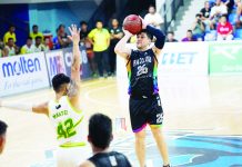 Bacolod City of Smiles’ Andretti Stevens (26) shoots over the defense of Paranaque Patriots’ Lean Vincent Martel (42). MPBL PHOTO