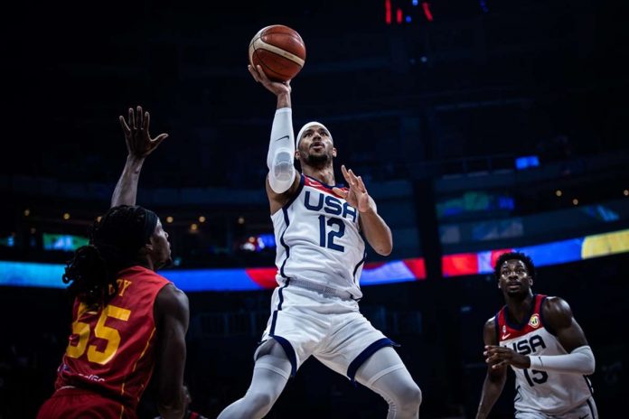 spots_FIBA_resized Team USA’s Josh Hart splits the Montenegro defense for an inside hit. FIBA PHOTO