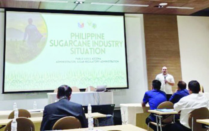 sugar_industry_resized Sugar Regulatory Administration chief Pablo Luis Azcona presents the Philippine Situationer of the Sugar Industry during the Sugarex Thailand 2023 Conference held on Sept. 14 to 15, 2023. “We continue to be positive of growth in the sugar industry,” he said in a statement Tuesday night, Sept. 19, 2023). SUGAR REGULATORY ADMINISTRATION PHOTO
