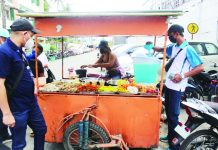 Food establishments and ambulant vendors should secure the necessary permits in compliance with the food and sanitation standards. Photo shows an ambulant vendor outside a government office in Iloilo City. ALFRED PACIENTE DELA CRUZ PHOTO