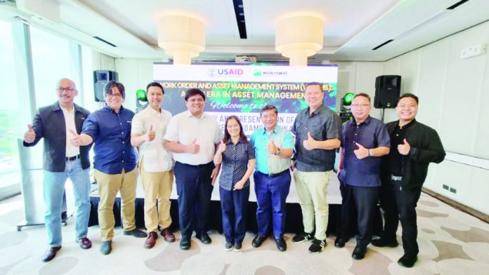 MORE_banner_for_oct26_resized MORE Electric and Power Corporation president and chief executive officer Roel Z. Castro (4th from right) leads the launching of the power firm’s Work Order and Asset Management System. With him are (from left) Engr. Bernard Bailey Del Castillo, MORE Power’s Vice President for Network Development and Operations Group; Emil Diez, Iloilo Business Club president; Jay Treñas, Executive Assistant to Iloilo City’s Mayor Jerry Treñas; Lyan B. Villacorta, Regional Energy and Climate Change Specialist, United States Agency for International Development; Mongolia Divina B. Chingcuanco, USAID-ESP; Iloilo Provincial Board member Rolando Distura; Cesar Emmanuelle Buyco, Jr.; and Rey Victor Garin.