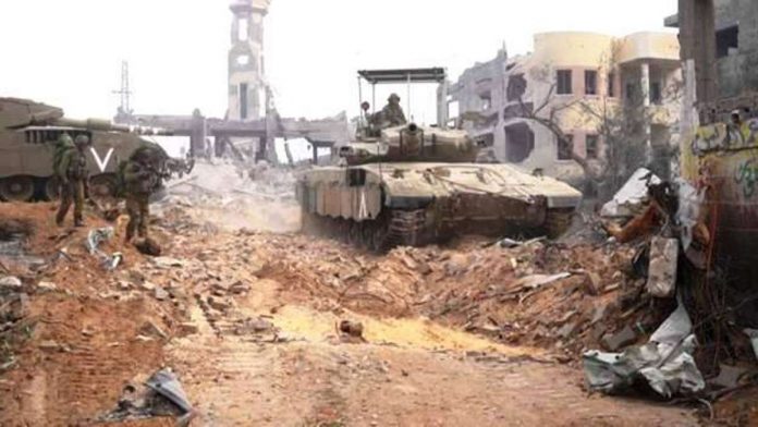 US_resized An Israeli tank moves through Gaza Strip, in footage supplied by the Israeli military. IDF PHOTO