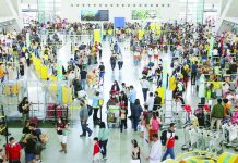 Airlines ready for long BSKE, ‘Undas’ break People fall in line at the check-in counters of the Ninoy Aquino International Airport (NAIA) Terminal 3 in Pasay City. The Manila International Airport Authority expects around 1.2 million passengers at the NAIA during the Barangay and Sangguniang Kabataan Elections and Undas break. GEORGE CALVELO/ABS-CBN NEWS PHOTO