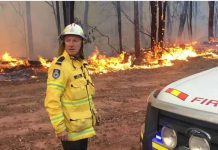 Australia’s bushfire season returns; Over 1,000 fires burn Down Under Trees burn behind a fire fighter in Asutralia. There are now over 100 fires across the country. BBC