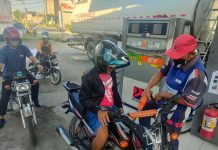 Motorcycle riders line up to refuel at Petron gas station in Mali-ao, Pavia, Iloilo. PN PHOTO