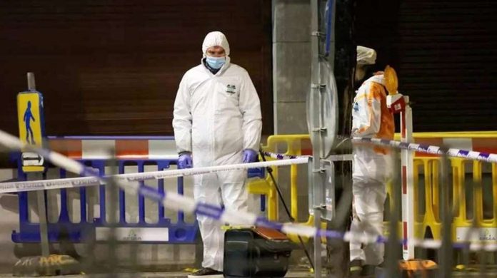 europe_resized Belgian police officers search for evidence after two people were killed during a shooting in Brussels. REUTERS