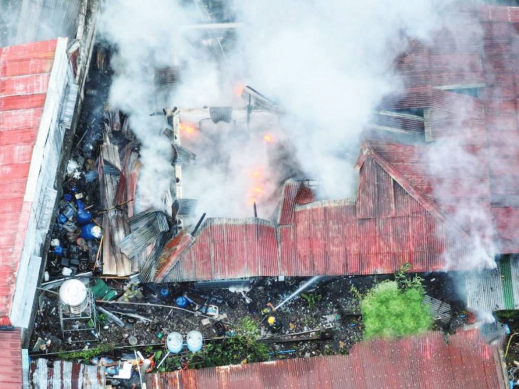 Fire Engulfs Warehouse 7 Houses