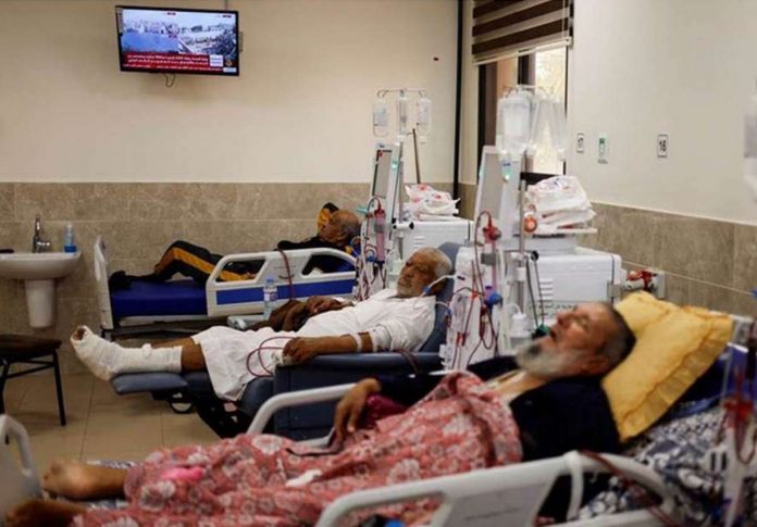 gaza_resized Palestinian kidney patients lie on hospital beds, as health officials say they are running out of fuel to operate dialysis devices, amid the ongoing Israeli-Palestinian conflict, at Naser hospital in Khan Younis in the southern Gaza Strip. REUTERS