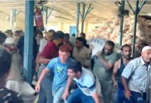 Palestinians break into UN warehouse for aid There is chaos at this Gaza Strip aid center as people grab supplies after a break-in. BBC