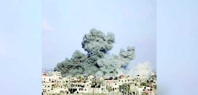 gaza_superimposed Smoke rises following Israeli airstrikes in Rafah, southern Gaza Strip. AP PHOTO/HATEM ALI