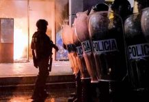 2-week pro-democracy protests paralyze Guatemala Riot police officers keep watch after clashing with demonstrators when trying to break blockades, as part of a national strike to demand the resignation of authorities from the attorney general’s office, in Guatemala City, Guatemala. REUTERS