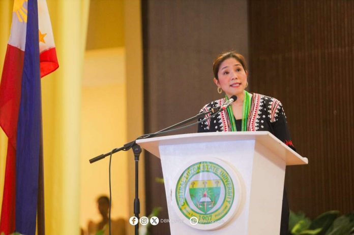 Department of Budget and Management secretary Amenah F. Pangandaman emphasizes the importance of fostering inclusive growth through innovation with impact during her keynote speech at the Research Innovation and Development Festival held at the Central Luzon State University on Monday, Oct. 9. DEPARTMENT OF BUDGET AND MANAGEMENT PHOTO