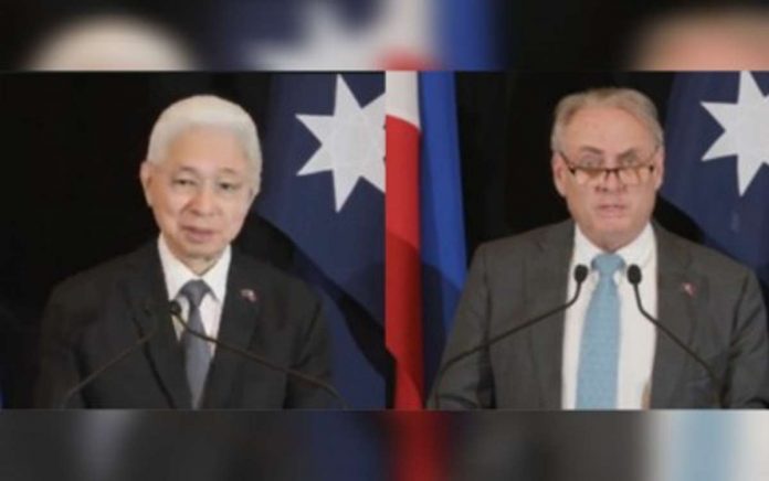 investment_deal_resized Trade Secretary Alfredo Pascual (left) and Australian Trade and Tourism Minister Don Farrell during a press conference on the sidelines of the 6th Philippines-Australia Ministerial Meeting (PAMM) held in Adelaide, Australia on Monday, Oct. 9. One of the takeaways from the PAMM is Australia's establishment of Investment Deal Team in Manila. SCREENSHOT/DEPARTMENT OF FOREIGN AFFAIRS AND TRADE YOUTUBE CHANNEL