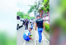 PSTMO maps loading, unloading bays for LPTRP Personnel of the Public Safety and Transportation Management Office of Iloilo City map out the loading and unloading bays in Jaro district. ILOILO CITY PTSMO FB