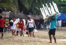 Southern Mexico braces for ‘catastrophic’ hurricane A man removes tables off a beach as Hurricane Otis barrels towards Acapul, Mexico. Residents in the hurricane’s path have been urged to move to emergency shelters. REUTERS