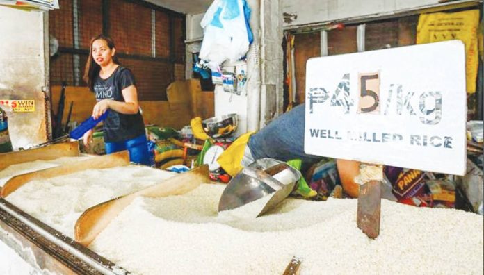 rice_pic.JPG_resized Samahang Industriya ng Agrikultura would be requesting President Ferdinand Marcos Jr. to reimpose the price cap on well-milled rice in November “to preempt new attempts to artificially increase the retail price of rice.” But the Department of Agriculture is against it. MARIA TAN/ABS-CBN NEWS PHOTO
