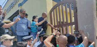 Administrator Antonio Mariano Almeda and other NEA officials faced challenges entering the Negros Occidental Electric Cooperative premises while attempting to serve a preventive suspension order to the cooperative’s general manager, Engr. Ray Bustamante. MAE SINGUAY/PN
