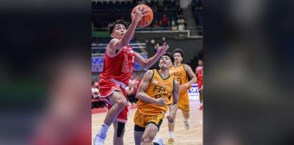 University of the East Red Warriors’ Rey Remogat goes for a fastbreak layup. UAAP PHOTO