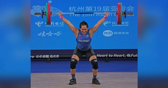 sports hidilyn_superimposed Filipina weightlifter Hidilyn Diaz-Naranjo successfully lifted the bar in the snatch event. PHOTO COURTESY OF PSC-POC MEDIA POOL