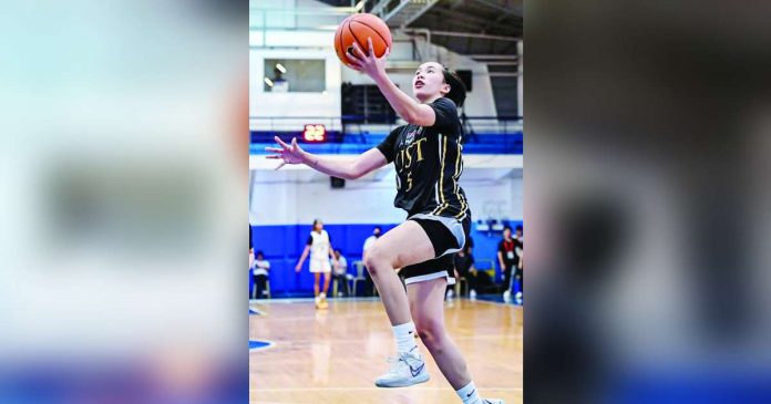 sports negrense_superimposed Negrense Kent Jane Pastrana of the University of Santo Tomas Growling Tigresses scores on a layup. UAAP PHOTO