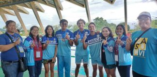 Members of the West Visayas State University swimming team, along with their coaches and school officials. PHOTO COURTESY OF RICHARD GABAYOYO