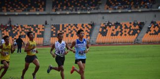 Stephine Dellariarte of Iloilo Science and Technology University leads a pack of runners during the National State Colleges and Universities Athletic Association Meet 2023. PHOTO COURTESY OF RASUC VI