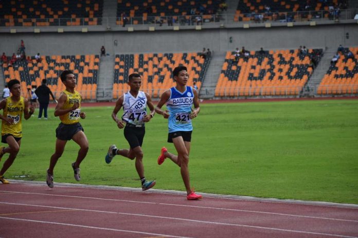 sports_WV_resized Stephine Dellariarte of Iloilo Science and Technology University leads a pack of runners during the National State Colleges and Universities Athletic Association Meet 2023. PHOTO COURTESY OF RASUC VI