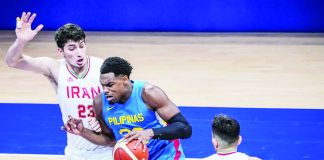 Justin Brownlee’s possible two-year suspension for failing a doping test would only be confirmed if his B-sample also tests positive for the prohibited carboxy-THC, which is associated with cannabis use. He is shown here tackling two Iranian players during the 19th Asian Games in China. PHOTO COURTESY OF POC-PSC MEDIA POOL