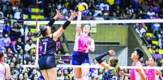 Creamline Cool Smashers’ Michele Gumabao goes for a drop shot against the defense of Cignal HD Spikers’ Frances Xinia Molina. PVL PHOTO