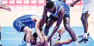 University of the Philippines Fighting Maroons’ Gerry Abadiano protects the ball from fellow Ilonggo Ian Espinosa and Joseph Obasa of Ateneo de Manila University Blue Eagles. UAAP PHOTO