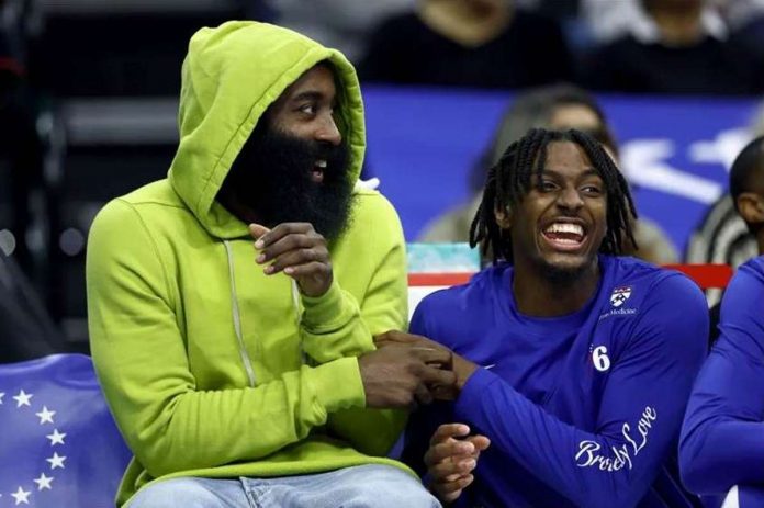 sports_james_resized James Harden (left) shared a light moment with Philadelphia guard Tyrese Maxey during the first quarter of the 76ers game against the Portland Trail Blazers at Wells Fargo Center in Philadelphia, on Oct. 29, 2023. PHOTO BY TIM NWACHUKWU/GETTY IMAGES