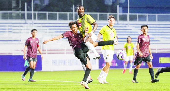sports_kaya_resized Kaya Futbol Club-Iloilo’s Abou Sy jumps into a University of the Philippines Fighting Maroons player during their 2023 Copa Paulino Alcantara quarterfinals match. PHOTO COURTESY OF KAYA-ILOILO