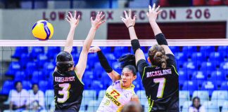 F2 Logistics Cargo Movers’ Ivy Lacsina scores against the defense of Nxled Chameleons’ Jhoanna Maraguinot. PVL PHOTO