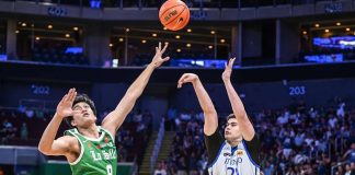 Ateneo de Manila University Blue Eagles’ Mason Amos scores over the defense of De La Salle University Green Archers’ Raven Cortez. UAAP PHOTO
