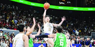 National University Bulldogs’ Patrick Wilson Yu goes for a floater. UAAP PHOTO