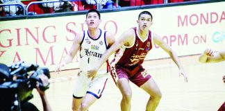 University of Perpetual Help Altas’ Angelo Gelsano (25) battles Colegio de San Juan de Letran Knights’ Joseph Nunag for the rebound. PHOTO BY NCAA/GMA SPORTS
