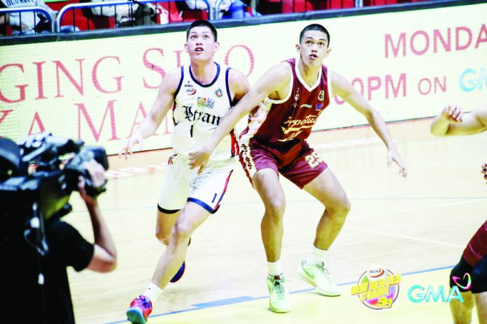 sports_rookie_resized University of Perpetual Help Altas’ Angelo Gelsano (25) battles Colegio de San Juan de Letran Knights’ Joseph Nunag for the rebound. PHOTO BY NCAA/GMA SPORTS