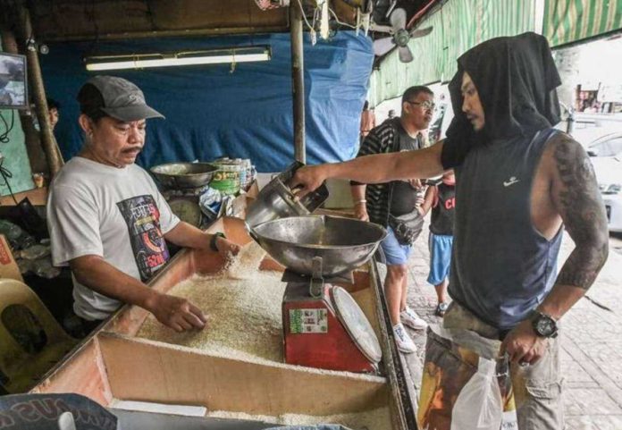 DA_assures.JPG_resized Rice prices are expected to rise in December to P48 per kilo for well-milled rice and P41 to P43 per kilo for regular-milled variety, according to the Department of Agriculture. MARIA TAN/ABS-CBN NEWS PHOTO