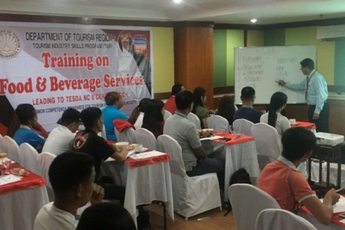 DOT_resized The Department of Tourism has so far trained 100,000 Filipino workers to ensure continued upliftment of quality tourism services for domestic and foreign tourists. PHOTO COURTESY OF PNA