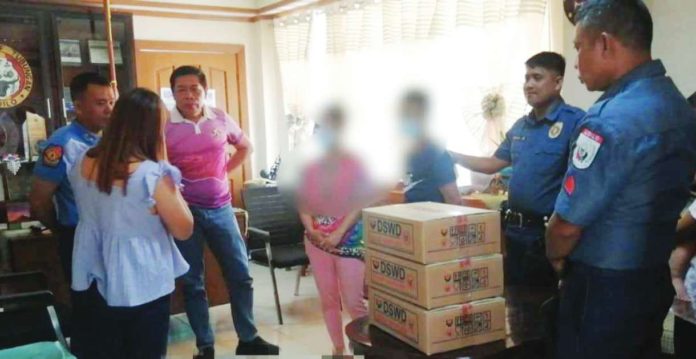 NPA surrender Policemen of Tubungan, Iloilo welcome the surrender of a couple (faces blurred for security reasons) who were members of the New People’s Army for seven years. At the municipal hall of Tubungan, initial reintegration assistance was released to the couple. ILOILO POLICE PROVINCIAL OFFICE PHOTO