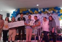 Leganes won first runner-up in this year’s Search for Most Persons with Disability-Friendly and Inclusive Municipalities in Iloilo province. Photo shows the town’s representatives receiving the P30,000 cash prize and plaque of recognition from Gov. Arthur Defensor Jr. and Provincial Social Welfare and Development Office officials. PN FILE PHOTO